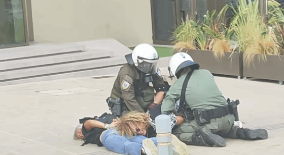 Videos show police rough-handling of teachers at Souda rally against Israeli ship